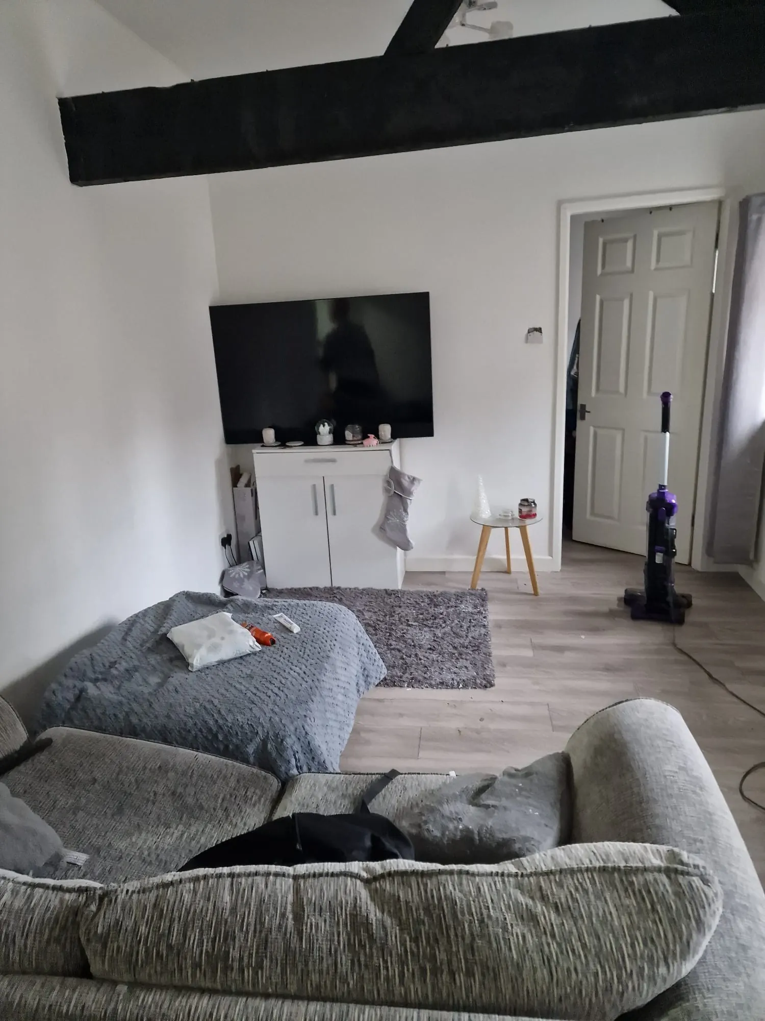 Main Street living room before clearance and cleaning